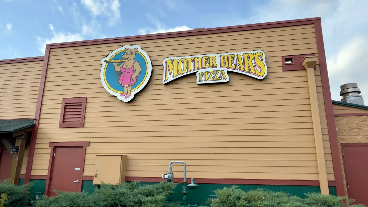 Mother Bear's side elevation with logo signage and service trim